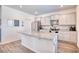 Modern kitchen featuring gray cabinets, granite countertops, and stainless steel appliances at 623 Meadowgrass Ct., Myrtle Beach, SC 29588