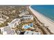 Aerial view of oceanfront community with pools at 645 Sandpiper Run Retreat Beach Circle, Pawleys Island, SC 29585