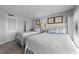 Two twin beds in a well-lit bedroom at 645 Sandpiper Run Retreat Beach Circle, Pawleys Island, SC 29585