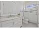 Modern bathroom with white vanity and glass shower at 65 Harbourreef Dr., Pawleys Island, SC 29585