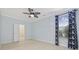 Cozy bedroom with ceiling fan and nautical-themed curtains at 65 Harbourreef Dr., Pawleys Island, SC 29585