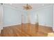 Light and airy bedroom with hardwood floors at 65 Harbourreef Dr., Pawleys Island, SC 29585