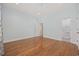 Light-filled bedroom with hardwood floors and ensuite bathroom at 65 Harbourreef Dr., Pawleys Island, SC 29585