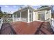 Deck with access to a screened porch at 65 Harbourreef Dr., Pawleys Island, SC 29585