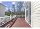 Spacious deck with wooden flooring and white railing at 65 Harbourreef Dr., Pawleys Island, SC 29585