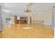 Bright living room with hardwood floors and a view of the kitchen at 65 Harbourreef Dr., Pawleys Island, SC 29585