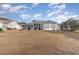 Home features a screened porch and fountain in the backyard at 6925 Ashley Cove Dr., Myrtle Beach, SC 29588