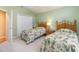 Charming bedroom with two twin beds and a large closet at 6925 Ashley Cove Dr., Myrtle Beach, SC 29588