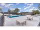 Community swimming pool with surrounding patio tables at 6925 Ashley Cove Dr., Myrtle Beach, SC 29588