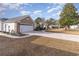 House exterior, showcasing the garage and landscaping at 6925 Ashley Cove Dr., Myrtle Beach, SC 29588