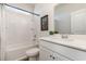 Bathroom featuring white fixtures, a shower-tub combo, and a modern design at 705 Choctaw Dr., Conway, SC 29526