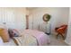 Well-lit bedroom showcasing a comfortable bed, stylish decor, neutral walls, and a cozy atmosphere at 705 Choctaw Dr., Conway, SC 29526