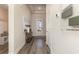 Bright foyer features wood floors, neutral walls, stylish decor and a front door with glass inserts for added natural light at 705 Choctaw Dr., Conway, SC 29526