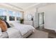 Bright primary bedroom boasting ample natural light, calming decor, and access to a walk-in closet at 705 Choctaw Dr., Conway, SC 29526
