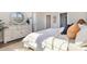 Inviting bedroom with a large bed, accent pillows, neutral decor, and a serene atmosphere at 705 Choctaw Dr., Conway, SC 29526
