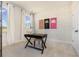 Bright home office with windows, neutral walls, stylish decor, and a functional desk area at 705 Choctaw Dr., Conway, SC 29526