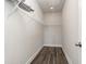 Walk-in closet featuring shelving, a hanging rod, and ample storage space at 705 Choctaw Dr., Conway, SC 29526