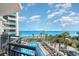 Balcony view of a resort pool and the ocean at 7100 N Ocean Blvd. # 320, Myrtle Beach, SC 29572