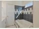 Bathroom with bathtub, shower, and black and white tile at 7570 Johnson Rd., Myrtle Beach, SC 29588