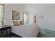 Bright bedroom with double bed, ensuite bathroom access, and large window at 7570 Johnson Rd., Myrtle Beach, SC 29588