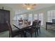 Dining room with dark wood table and access to the kitchen at 7570 Johnson Rd., Myrtle Beach, SC 29588