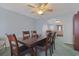 Bright dining room with wood table and access to the living room at 7570 Johnson Rd., Myrtle Beach, SC 29588