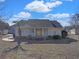 Charming one-story home with brick facade and welcoming front porch at 7570 Johnson Rd., Myrtle Beach, SC 29588