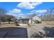 House exterior with driveway and screened porch at 7570 Johnson Rd., Myrtle Beach, SC 29588