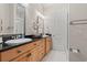 Double vanity bathroom with granite countertops and light wood cabinets at 8058 Verona Dr., Myrtle Beach, SC 29572