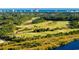 Aerial view of the golf course with water features at 8058 Verona Dr., Myrtle Beach, SC 29572