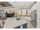 Modern kitchen with white cabinets, large island, and stainless steel appliances at 8058 Verona Dr., Myrtle Beach, SC 29572