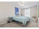 Cozy bedroom with a comfortable bed, blue accents, and ample natural light at 817 Old Castle Loop, Myrtle Beach, SC 29579