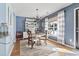 Charming dining room with a white table and chairs set on a patterned rug at 817 Old Castle Loop, Myrtle Beach, SC 29579