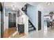 Inviting entryway with hardwood floors and black doors at 817 Old Castle Loop, Myrtle Beach, SC 29579