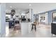 Bright kitchen with white cabinetry, granite countertops, and open layout to the dining area at 817 Old Castle Loop, Myrtle Beach, SC 29579