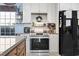 Close up on the stainless steel oven and white cabinets in the kitchen at 817 Old Castle Loop, Myrtle Beach, SC 29579