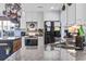 Modern kitchen with granite countertops, stainless steel appliances, and a breakfast bar seating area at 817 Old Castle Loop, Myrtle Beach, SC 29579