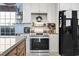 Modern kitchen showcasing stainless steel oven, white cabinets and granite countertops at 817 Old Castle Loop, Myrtle Beach, SC 29579