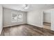 Bright bedroom with wood-look floors and large window at 869 Silvercrest Dr., Myrtle Beach, SC 29579