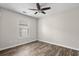 Bright bedroom featuring wood-look floors and a ceiling fan at 869 Silvercrest Dr., Myrtle Beach, SC 29579