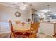 Kitchen and dining area with table and chairs at 880 Fairway Dr. # 302Bb, Longs, SC 29568