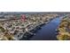 High angle aerial shot of waterfront condominiums with private boat docks, convenient parking, and lush surrounding landscape at 901 West Port Dr. # 1706, North Myrtle Beach, SC 29582