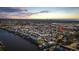 A panoramic aerial shot of the property highlighting its waterfront location near a beautiful coastline at sunset at 901 West Port Dr. # 1706, North Myrtle Beach, SC 29582