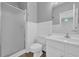 Bathroom featuring a walk-in shower and wainscoting at 901 West Port Dr. # 1706, North Myrtle Beach, SC 29582