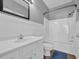 Clean bathroom features a white vanity, shower and tub combo, and modern fixtures at 901 West Port Dr. # 1706, North Myrtle Beach, SC 29582
