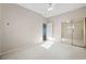 Bedroom with mirrored closet and neutral carpeting at 901 West Port Dr. # 1706, North Myrtle Beach, SC 29582