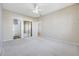 Bedroom with mirrored closet doors and neutral carpeting at 901 West Port Dr. # 1706, North Myrtle Beach, SC 29582