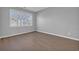 Bedroom featuring a view from the double-paned window and neutral walls at 901 West Port Dr. # 1706, North Myrtle Beach, SC 29582