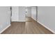 Bedroom showcasing light, airy wall color and complementing wood-look flooring at 901 West Port Dr. # 1706, North Myrtle Beach, SC 29582
