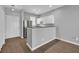 Well-lit kitchen area with a peninsula featuring a breakfast bar, and stainless steel appliances offer functionality and style at 901 West Port Dr. # 1706, North Myrtle Beach, SC 29582